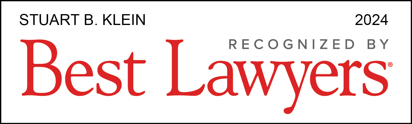 A red and white logo for the law office of richard l. Lawrence